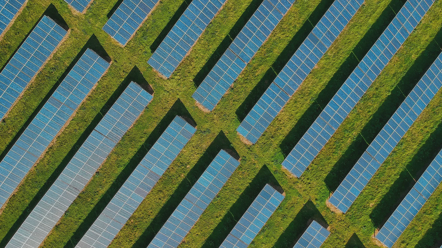 Aerial view of large solar panel farm.